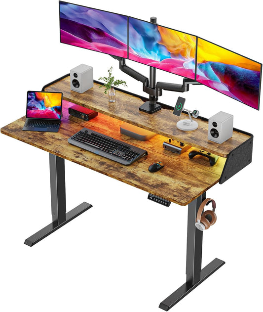 Kyspho 55″ x 28″ Electric Standing Desk with LED, Height Adjustable RGB Gaming Desk with Storage Shelf, Sit Stand Desk with Dual Cable Holes, 4 Preset Heights for Home Office, Brown