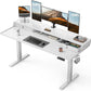 CHITOOMA 63″ x 28″ Electric Standing Desk with Drawers, Height Adjustable Gaming Desk with Monitor Stand & Storage Shelf, 4 Preset Heights for Home Office, White